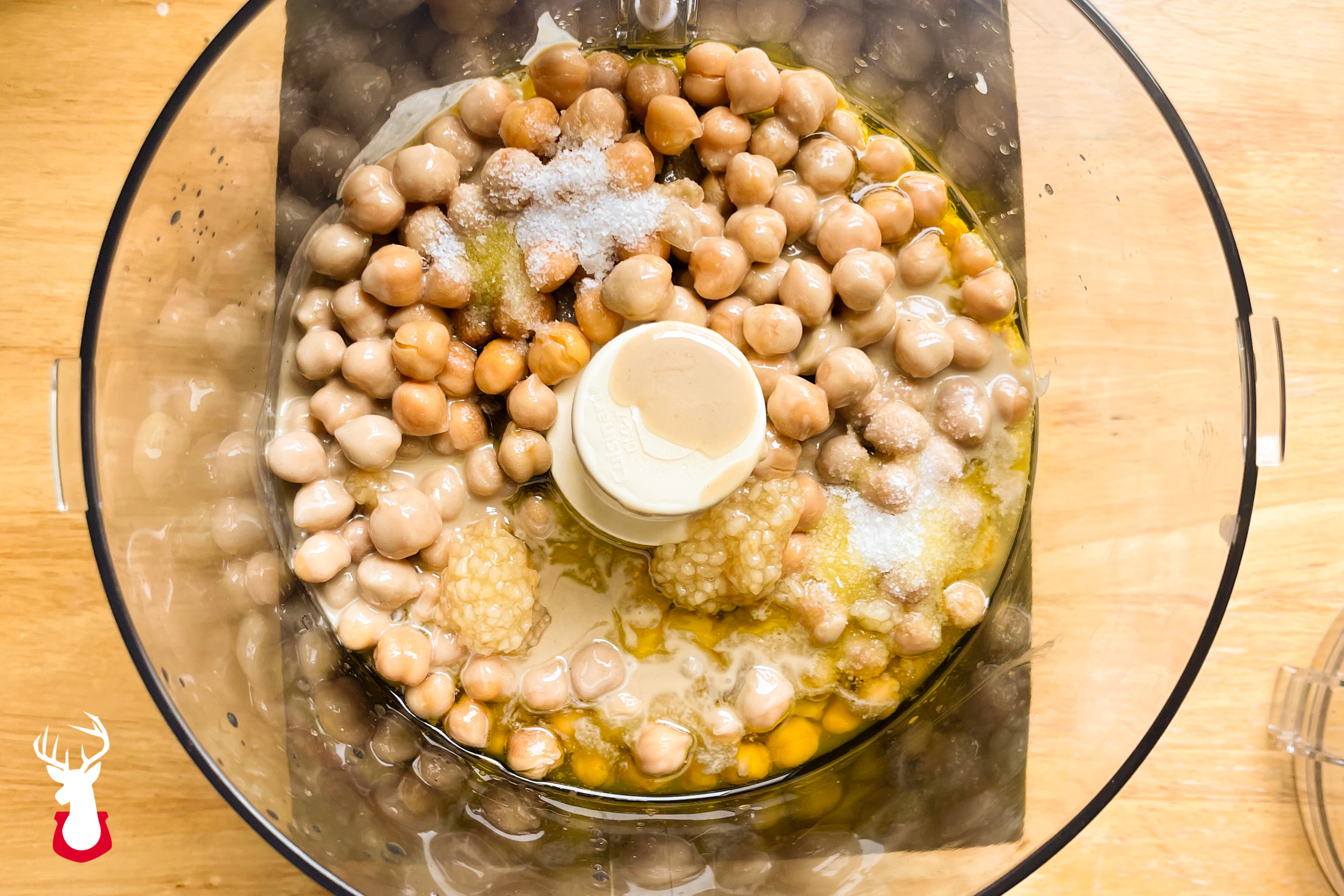 Overhead photo of chickpeas about to be blended into hummus.